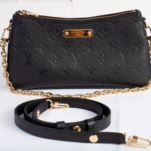 Authentic Louis Vuitton Black Monogram Empreinte Leather Liv Pochette